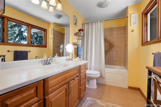 7753 Red Fox Dr, Evergreen, CO 80439 - bathroom with tile patterned flooring, toilet, vanity, shower / tub combo with curtain, and a chandelier