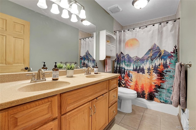 7753 Red Fox Dr, Evergreen, CO 80439 - full bath featuring tile patterned flooring, double vanity, and toilet
