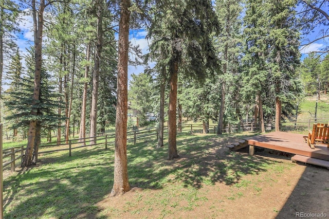 7753 Red Fox Dr, Evergreen, CO 80439 - view of yard with a wooden deck