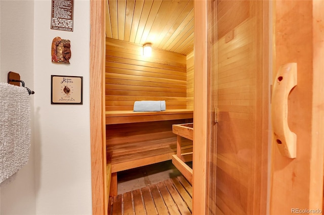 7753 Red Fox Dr, Evergreen, CO 80439 - sauna / steam room featuring wood walls, wooden ceiling, and hardwood / wood-style floors