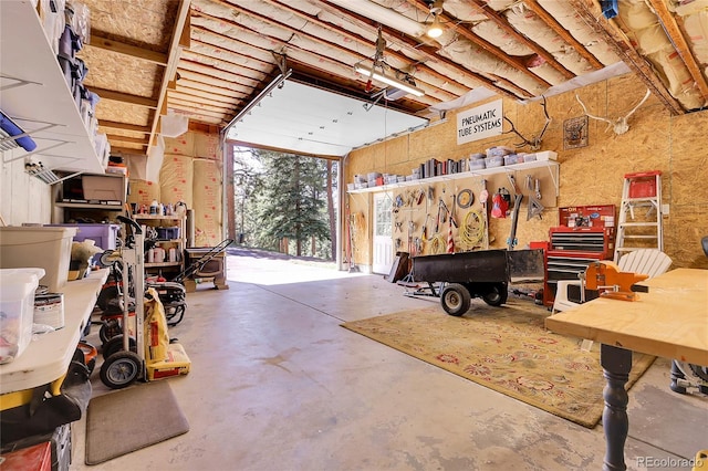 7753 Red Fox Dr, Evergreen, CO 80439 - garage with a workshop area