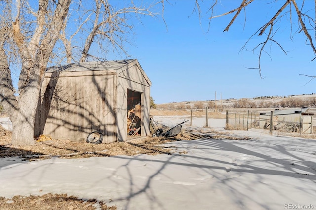 view of property exterior featuring an outbuilding