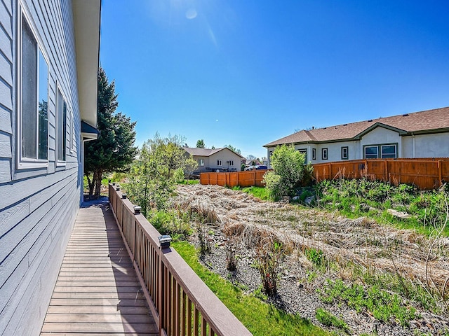 7809 S Flower St, Littleton, CO 80128 - view of side of home featuring fence