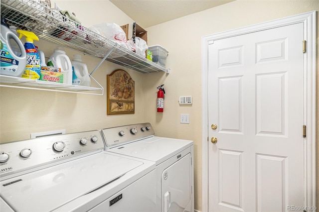 8300 Fairmount Dr Unit M103, Denver, CO 80247 - laundry area with independent washer and dryer