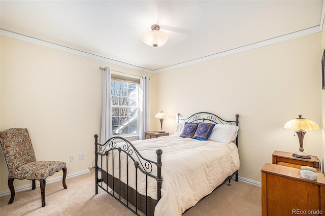 8300 Fairmount Dr Unit M103, Denver, CO 80247 - bedroom with light carpet, crown molding, and baseboards