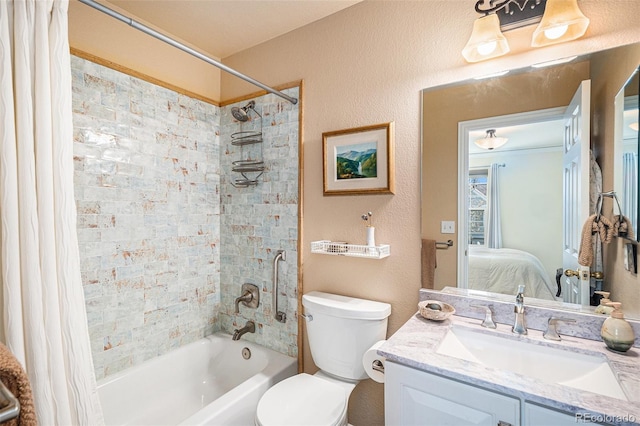 8300 Fairmount Dr Unit M103, Denver, CO 80247 - bathroom featuring shower / tub combo, ensuite bath, vanity, and toilet