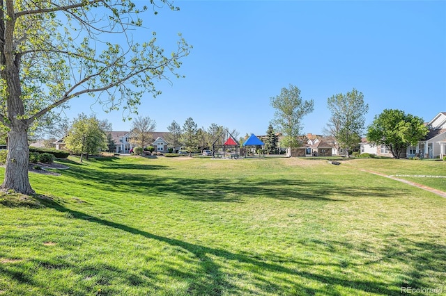8300 Fairmount Dr Unit M103, Denver, CO 80247 - view of community with a yard and a residential view