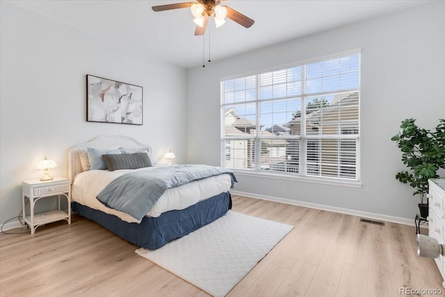 3862 E 127th Ln, Thornton, CO 80241 - bedroom with light wood-style flooring and ceiling fan
