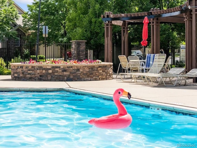 3862 E 127th Ln, Thornton, CO 80241 - community pool featuring a patio area