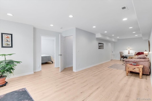 3862 E 127th Ln, Thornton, CO 80241 - living room featuring light wood-style floors and recessed lighting