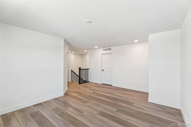 28564 E 6th Pl, Watkins, CO 80137 - unfurnished room with light wood finished floors and recessed lighting