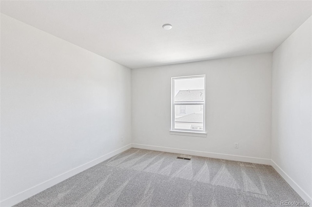 28564 E 6th Pl, Watkins, CO 80137 - unfurnished room featuring light colored carpet and baseboards
