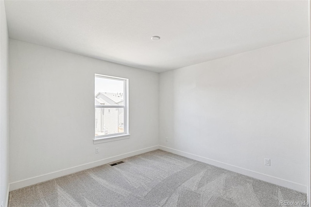 28564 E 6th Pl, Watkins, CO 80137 - unfurnished room featuring baseboards and carpet