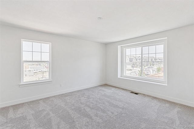 28564 E 6th Pl, Watkins, CO 80137 - carpeted spare room featuring baseboards