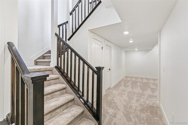 28564 E 6th Pl, Watkins, CO 80137 - stairs featuring carpet and recessed lighting