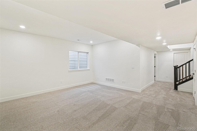 28564 E 6th Pl, Watkins, CO 80137 - empty room with recessed lighting, light carpet, and stairway