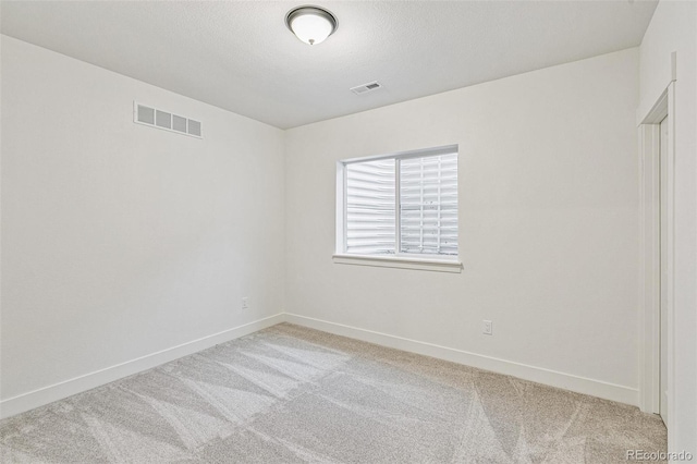 28564 E 6th Pl, Watkins, CO 80137 - spare room with light colored carpet and baseboards