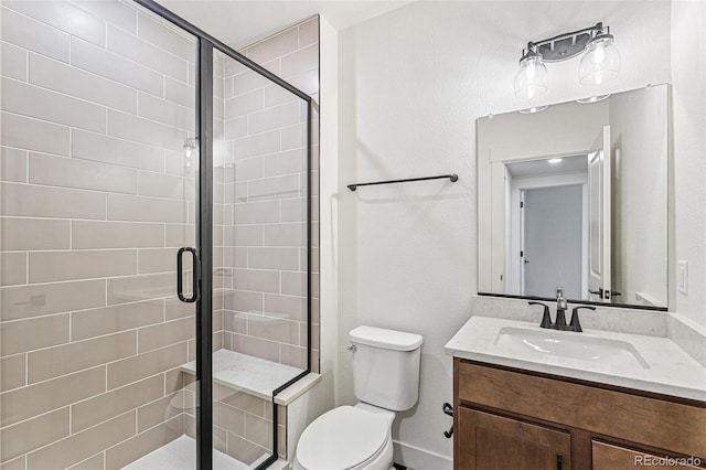 28564 E 6th Pl, Watkins, CO 80137 - bathroom featuring vanity and a stall shower