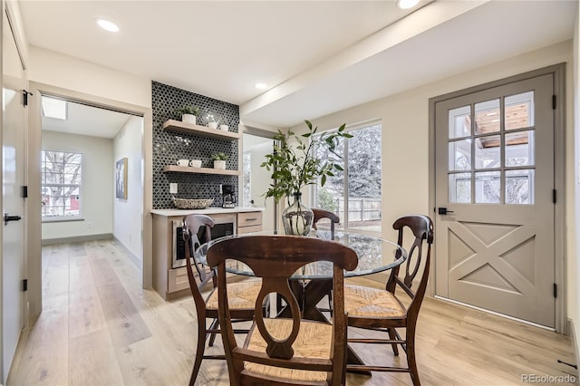 dining space featuring light hardwood / wood-style floors