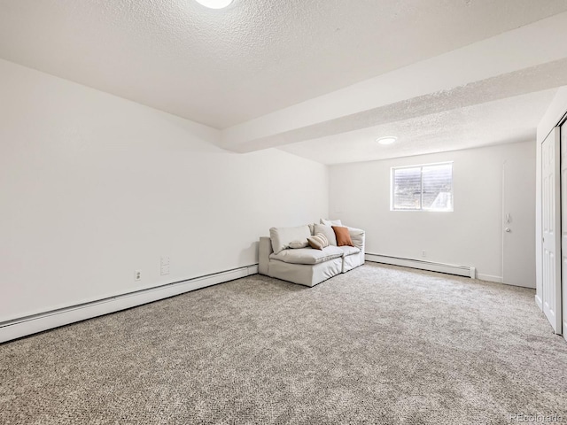 10895 Fairfax Way, Thornton, CO 80233 - unfurnished room featuring a baseboard radiator, carpet, and a textured ceiling