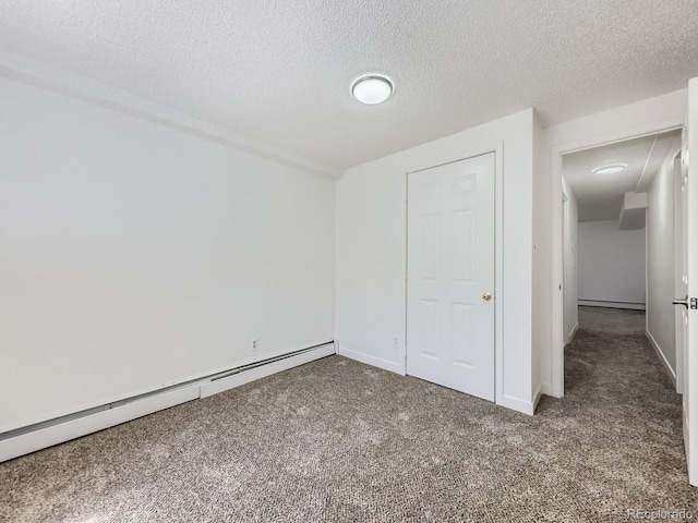 10895 Fairfax Way, Thornton, CO 80233 - unfurnished bedroom with carpet, a baseboard heating unit, and a textured ceiling