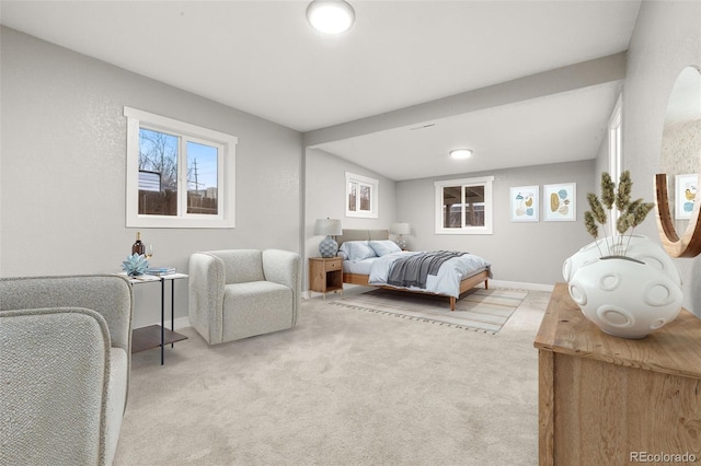 bedroom with baseboards and carpet flooring