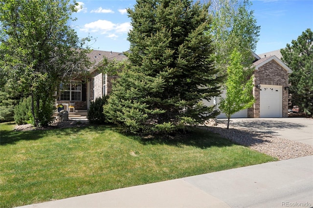 view of front of house featuring brick siding, a front yard, concrete driveway, and roof with shingles