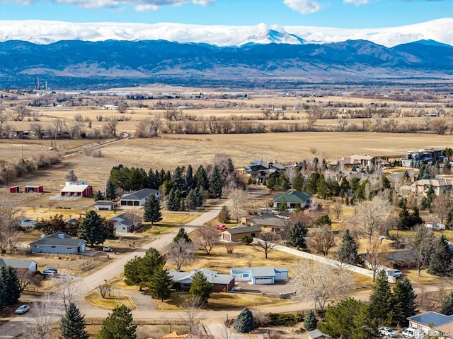 drone / aerial view with a rural view and a mountain view