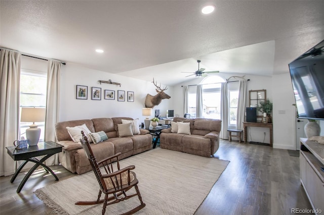 50 S Dickson St, Keenesburg, CO 80643 - living area with a ceiling fan, wood finished floors, vaulted ceiling, and recessed lighting