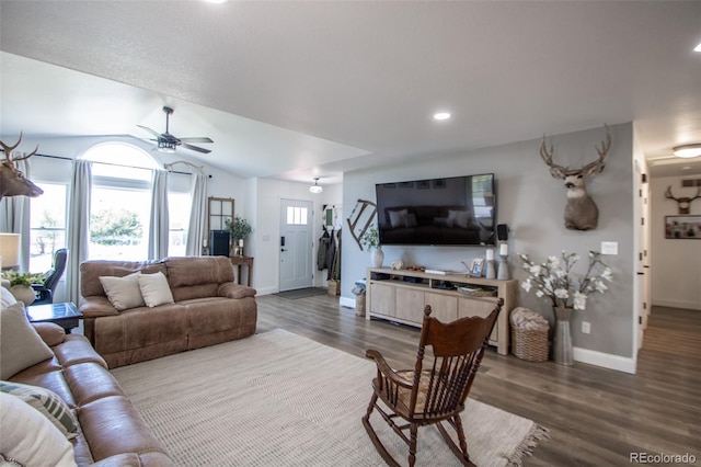 50 S Dickson St, Keenesburg, CO 80643 - living area featuring baseboards, wood finished floors, vaulted ceiling, a ceiling fan, and recessed lighting