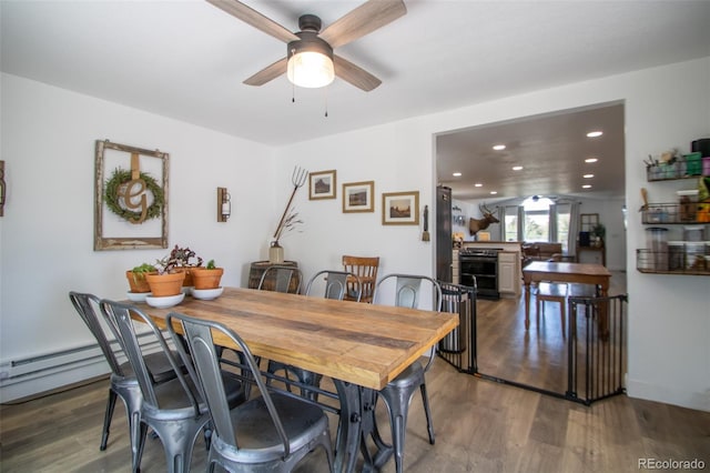 50 S Dickson St, Keenesburg, CO 80643 - dining area featuring a ceiling fan, recessed lighting, and wood finished floors