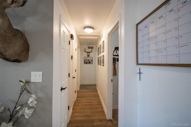 50 S Dickson St, Keenesburg, CO 80643 - hall with wood finished floors