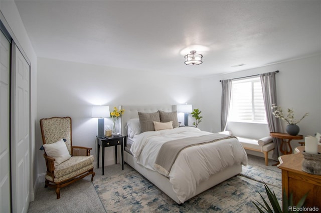 50 S Dickson St, Keenesburg, CO 80643 - bedroom featuring a closet and light colored carpet