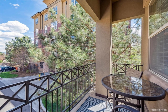 balcony featuring outdoor dining space