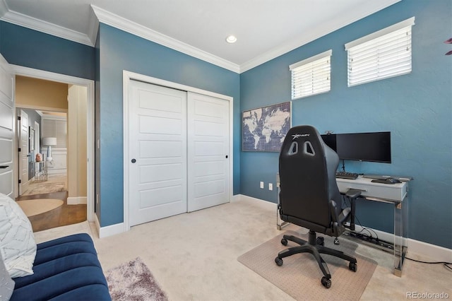 carpeted home office with crown molding and baseboards