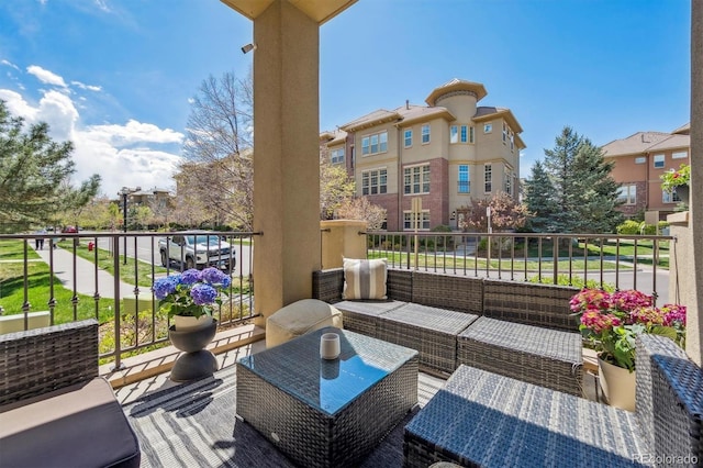 view of patio / terrace featuring an outdoor living space and a balcony