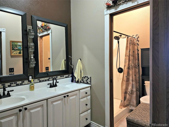 83 Wilderness Cornerstone Rd, Evergreen, CO 80439 - bathroom with backsplash, double vanity, a shower with curtain, and a textured wall
