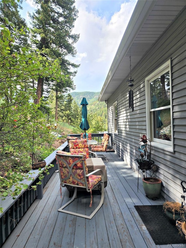 83 Wilderness Cornerstone Rd, Evergreen, CO 80439 - view of deck