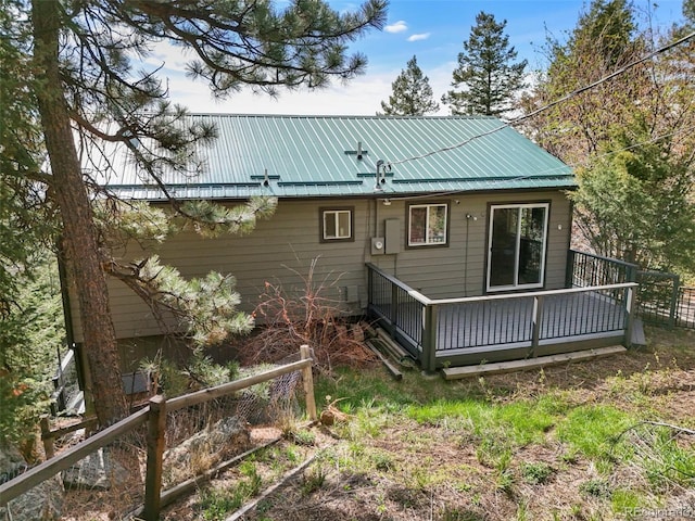 8386 S Davco Dr, Morrison, CO 80465 - rear view of property with a deck and metal roof