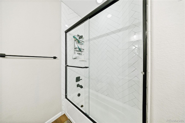 1925 Peregrine Dr, Brighton, CO 80601 - full bath with shower / bath combination with glass door and baseboards