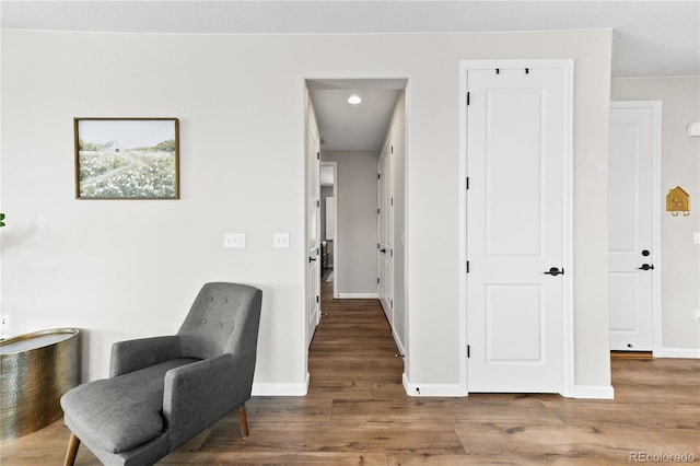 1925 Peregrine Dr, Brighton, CO 80601 - living area featuring wood finished floors and recessed lighting