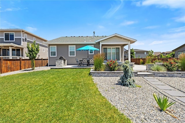 1925 Peregrine Dr, Brighton, CO 80601 - back of house with a patio area
