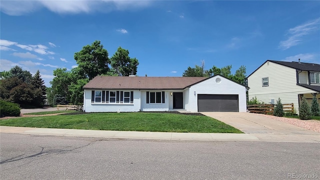 10297 W Crestone Mtn, Littleton, CO 80127 - ranch-style house featuring a garage, a front yard, concrete driveway, and stucco siding