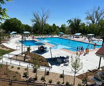 10297 W Crestone Mtn, Littleton, CO 80127 - community pool with a patio