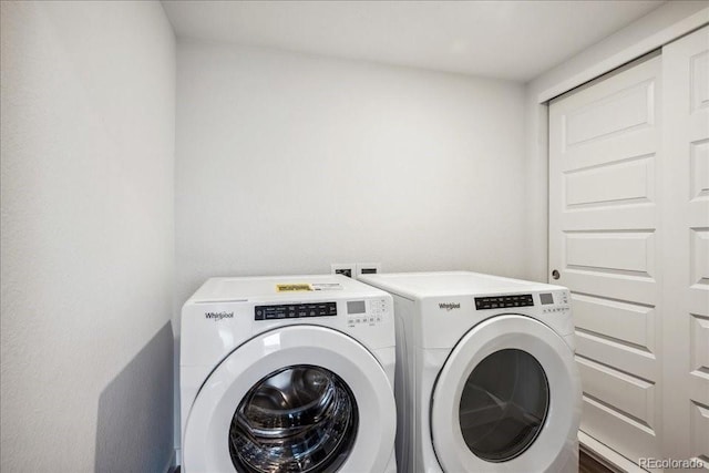 laundry room with laundry area and washer and dryer