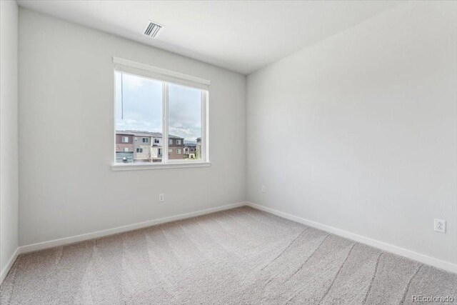 485 Interlocken Blvd Unit 209, Broomfield, CO 80021 - carpeted spare room with baseboards
