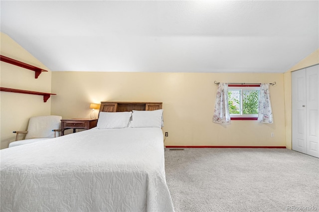 1777 Main St, Georgetown, CO 80444 - carpeted bedroom with lofted ceiling, baseboards, and a closet