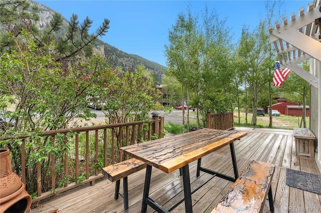 1777 Main St, Georgetown, CO 80444 - wooden terrace featuring outdoor dining space and a mountain view