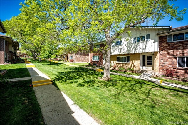 12632 W Virginia Ave, Lakewood, CO 80228 - view of property's community featuring a lawn