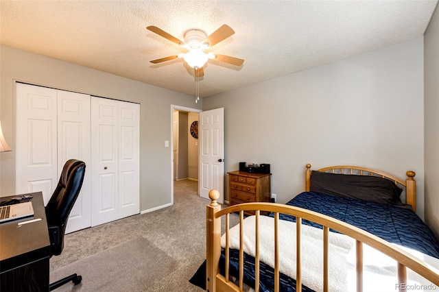 12632 W Virginia Ave, Lakewood, CO 80228 - carpeted bedroom with a desk, a closet, a textured ceiling, and a ceiling fan
